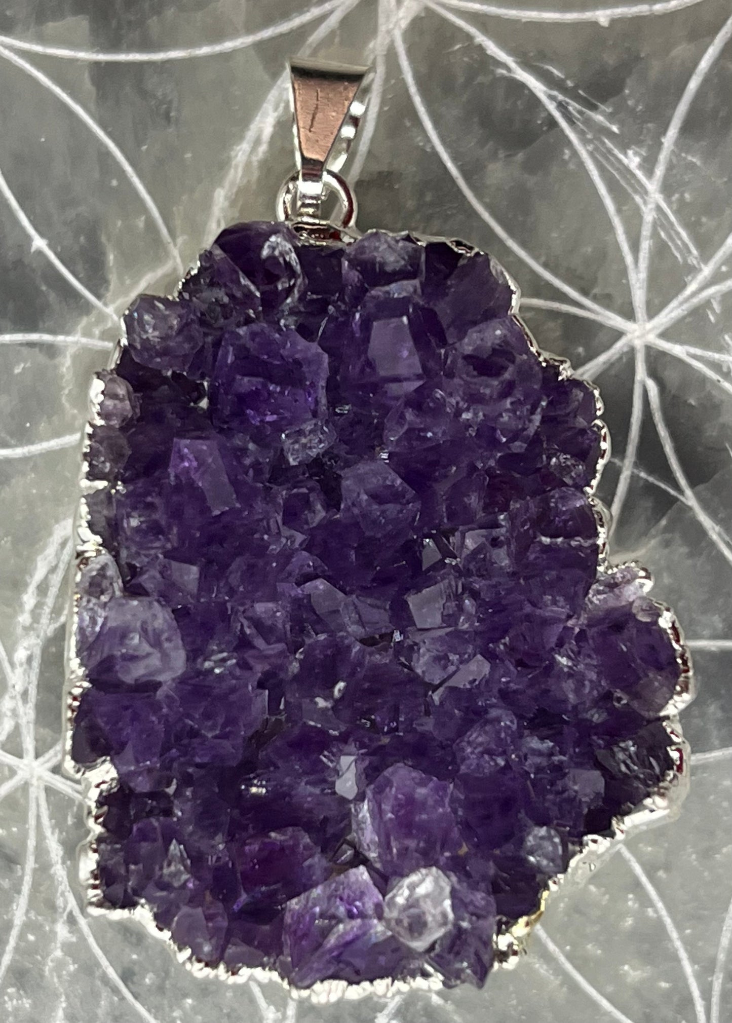 Pendentif Améthyste sertie
