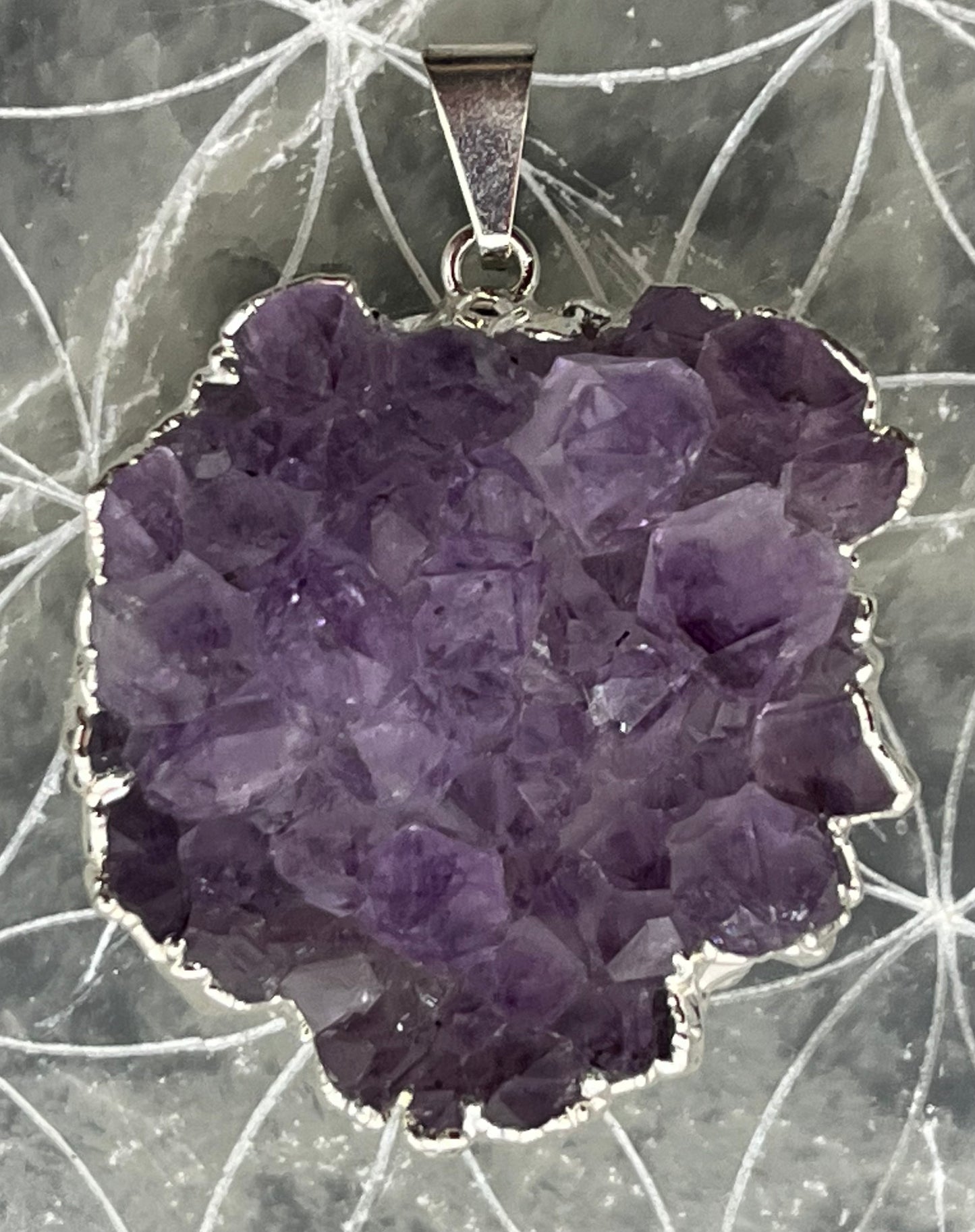 Pendentif Améthyste sertie