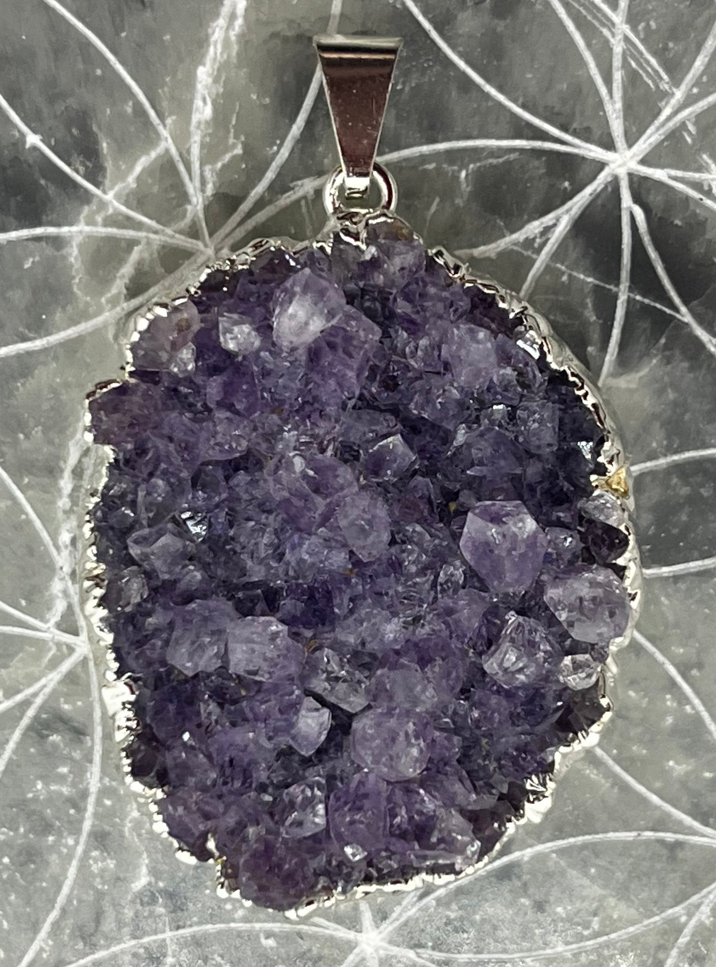 Pendentif Améthyste sertie